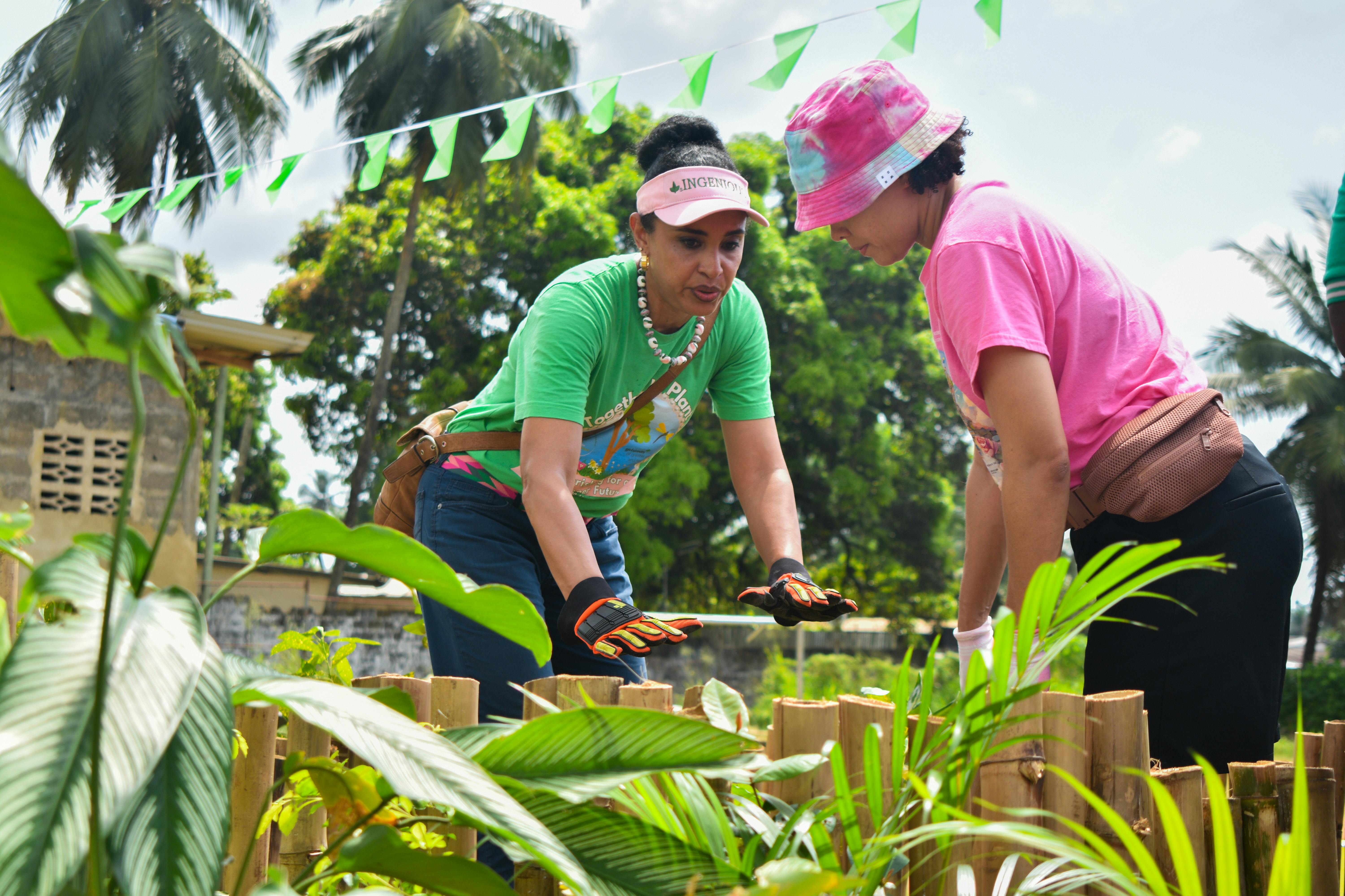Community garden with workers tending crops