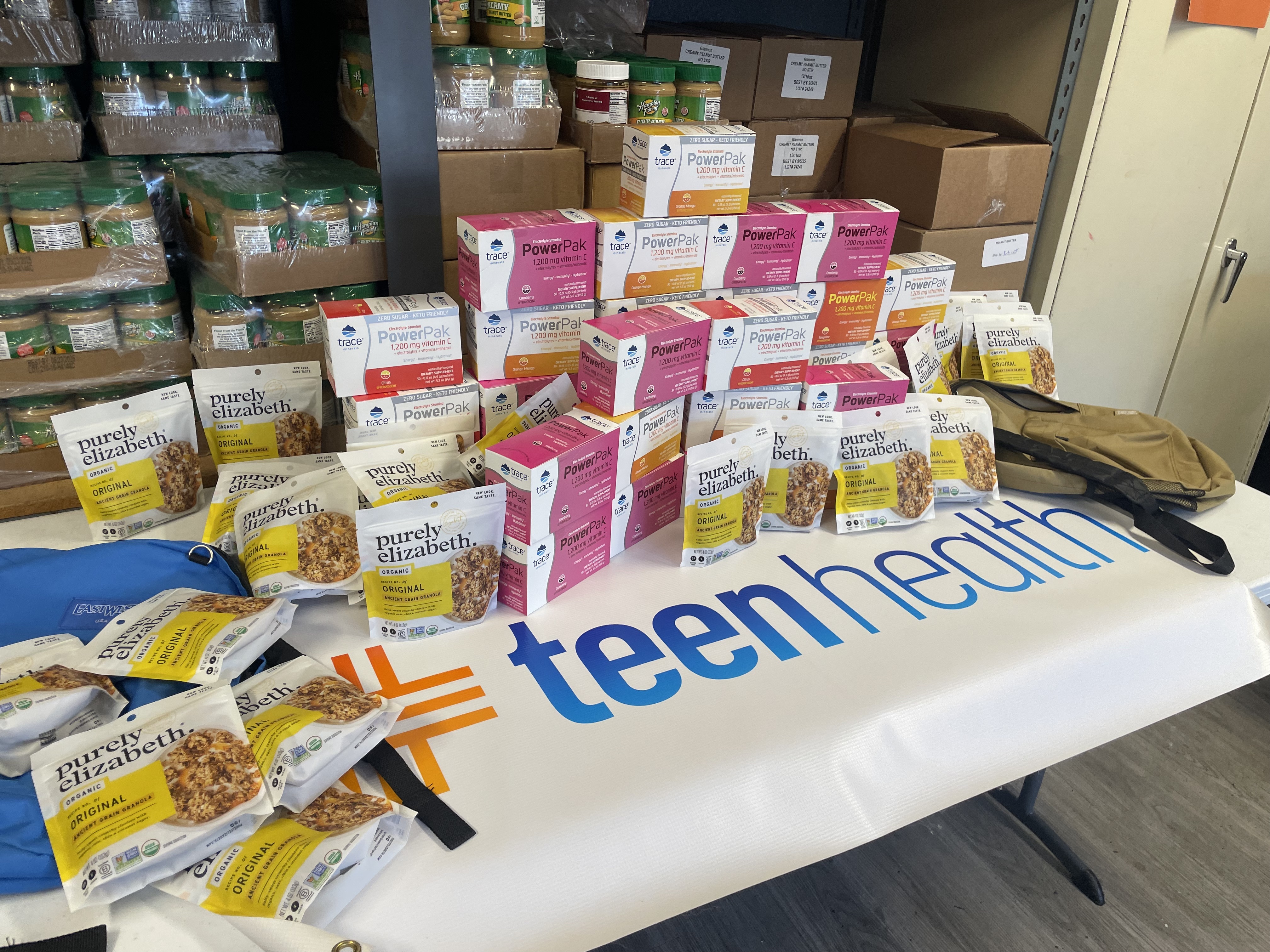 Volunteers preparing essentials kits