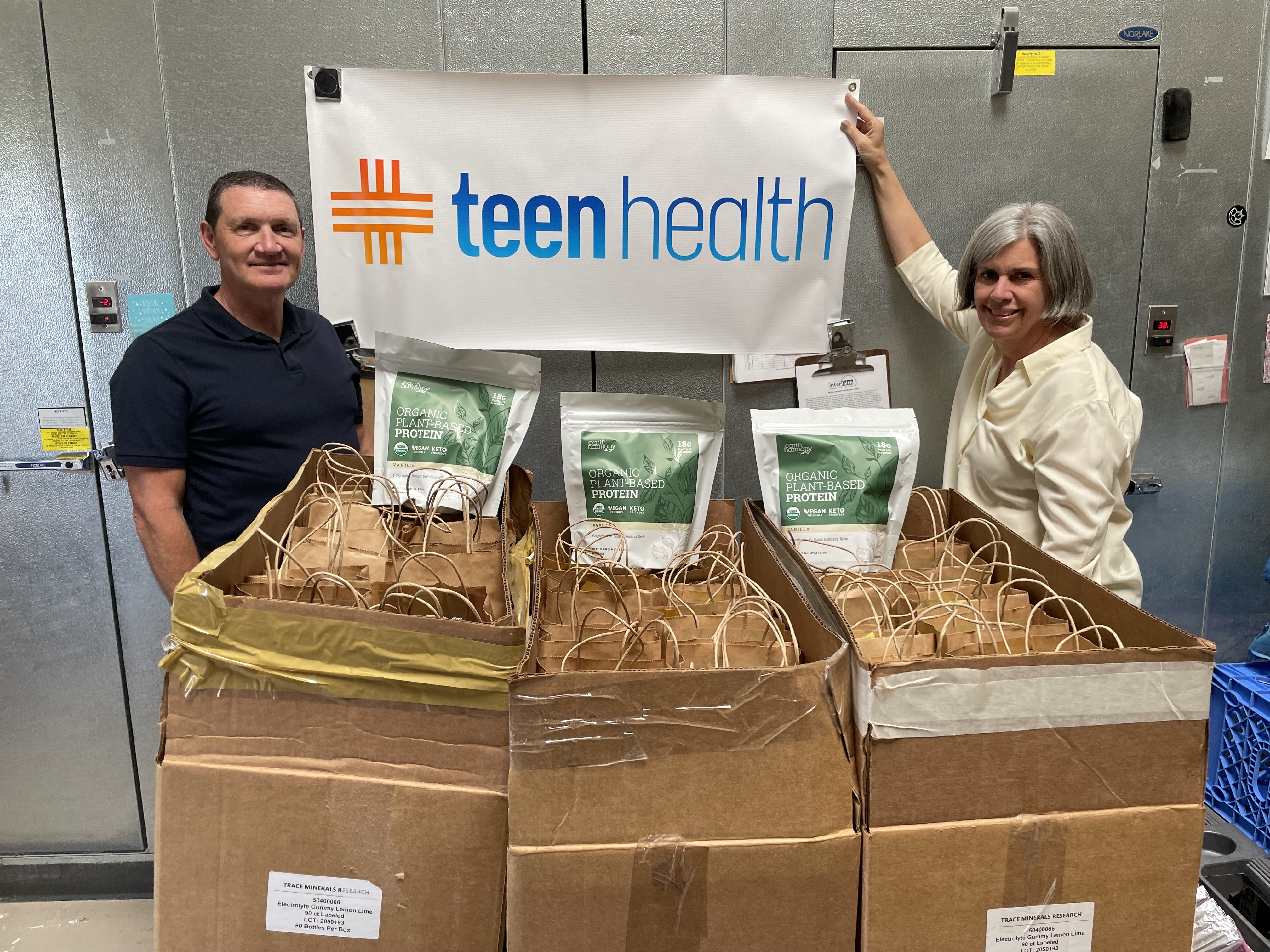 Volunteers with Earth Harmony boxes